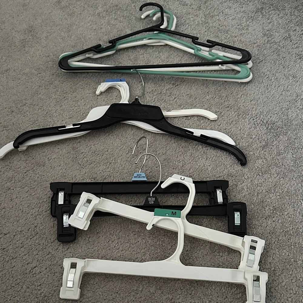 Assorted Plastic Hangers - Black, White, Green